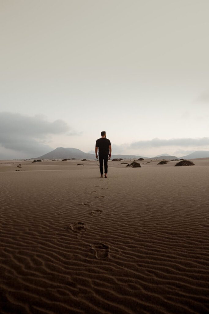Man walking on desert