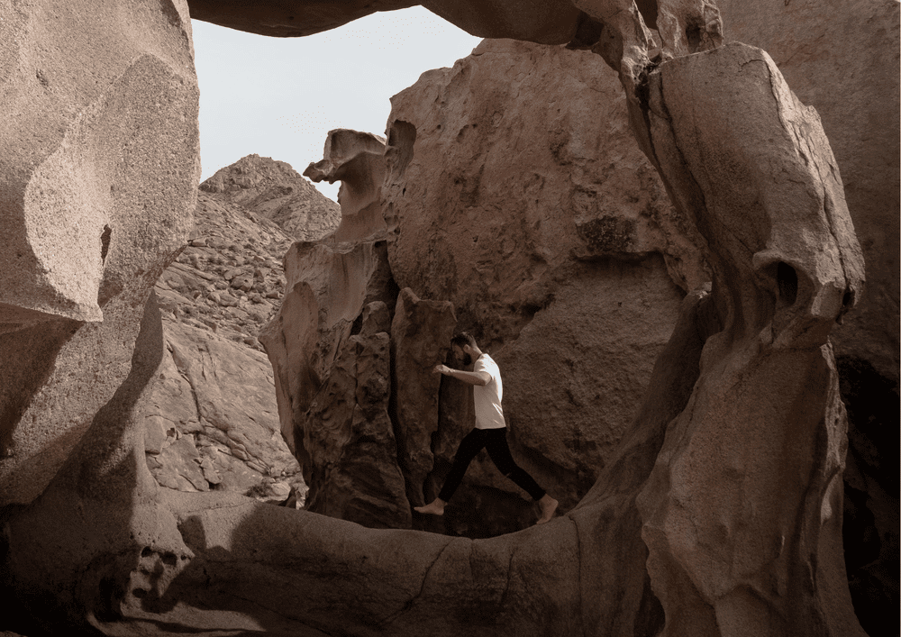 A man in desert canyon